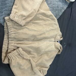 Cropped jacket alters state